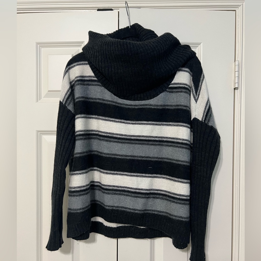Moda International wool oversized turtleneck sweater in black and white stripes